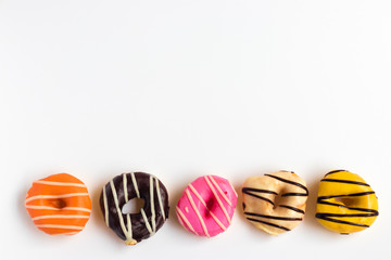 Donuts Set on White Background. You get different type of donuts, Top view.