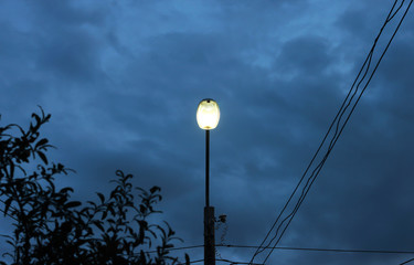 Fototapeta na wymiar Power poles in the evening keep the light.