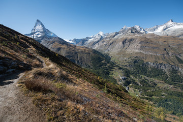scenery from Matterhorn in switzerland from a imposing hiking trail to zermatt.
