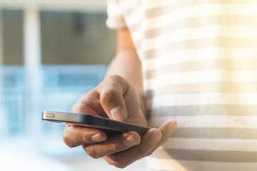 young man using mobile phone.