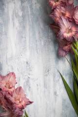 light background with texture framed with flowers, nobody