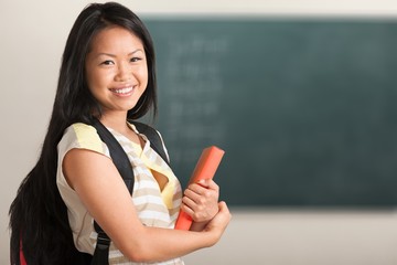 Young Female College Student  on background