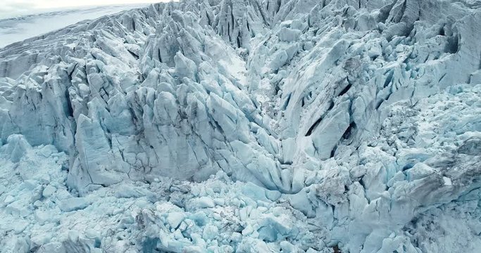 Folgefonna glacier. Glacial blue ice. Melting ice cap. Norway. Aerial view.