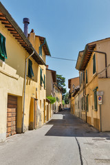 Fototapeta na wymiar Montopoli in Val d'Arno narrow street architecture. Tuscany, Italy.