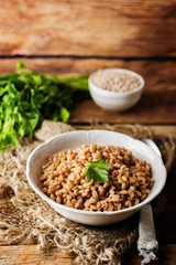 Barley porridge decorated with parsley leaves