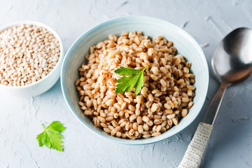 Barley porridge decorated with parsley leaves