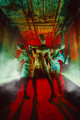 A group of zombie women with the flaming eyes is going to catch you. Halloween theme.