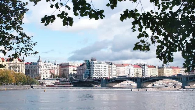 View of the Dancing House and the Jiraskuv bridge in the old town of Prague.
