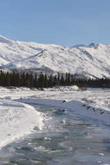 Alaska mountains and stream in winter