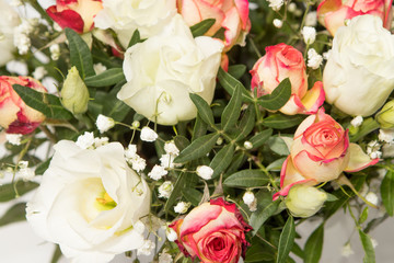 beautiful delicate floral bouquet with yellow pink shades on the background