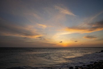 Naklejka na ściany i meble Amazing beauty colorful sunset on Caribbean. Aruba island. Unforgettable view. Amazing background.