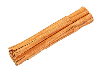 One cinnamon roll isolated on white background. Ceylon cinnamon stick.
