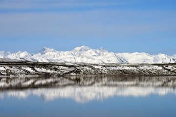 winter landscape with lake and mountains