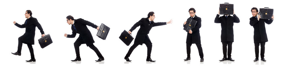 Young man holding suitcase isolated on white