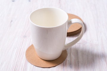 White potvelain tea of coffee cup on cound cardboard Round Coasters, cup pad, mat, holder