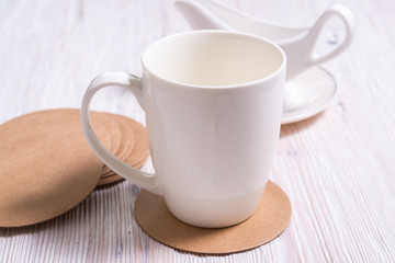 White potvelain tea of coffee cup on cound cardboard Round Coasters, cup pad, mat, holder