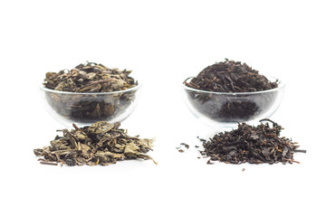 Dried black and green tea leaves.