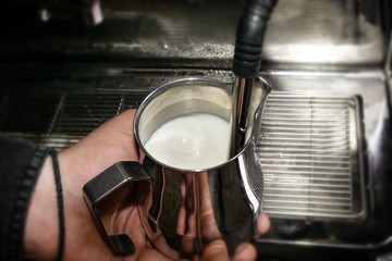 Making coffee in coffeeshop or cafe closeup