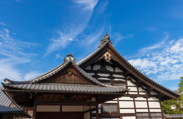 Naklejka premium Cloudy Sky over traditional building in Kyoto Japan
