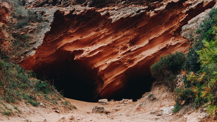 natural caves located on the coast with texture similar to that of natural canyones