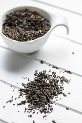 Dried black tea leaves.