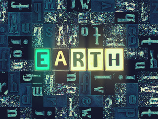 Word Earth with electric letters as neon glowing symbols