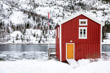 Old seahouse and winter by the river Vefsna in Mosj&oslash;en city