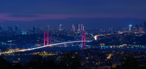 Fototapeta na wymiar Istanbul Bosphorus Bridge in the evening. July 15 Martyrs Bridge (July 15 Martyrs Bridge). Image from the top of Camica. Istanbul Turkey.