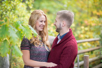 Fototapeta premium A portrait of young married couple expecting a baby