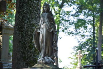Angel statue in cemetery. Religious beliefs