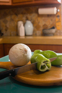 Chopping ingredients in the kitchen island
