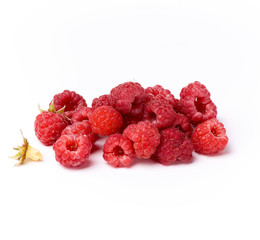 bunch of red ripe raspberries on a white background
