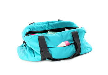 Sport bag with deodorant on white background