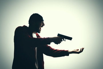 Robber with a gun