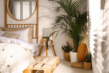 Stylish modern room interior with  comfortable bed