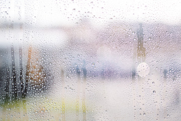 drops of autumn rain on the window macro
