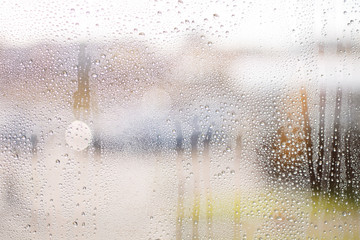 drops of autumn rain on the window macro