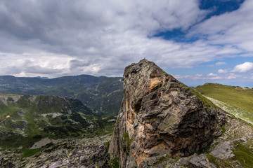 Amazing peak with person on it at Rila mountain i Bulgaria.