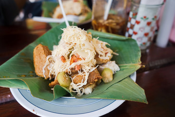 Vigoron, a typical dish from Nicaragua. nicaragua food with pork and casava.