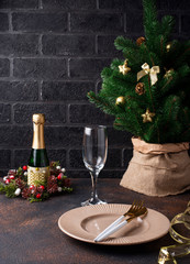 Christmas table setting and golden decor