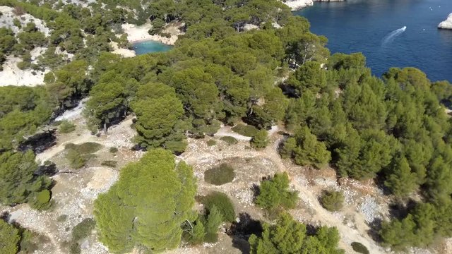 Aerial clip over on the cliffs, Calanques de Port Pin bay, Calanques National Park near Cassis fishing village, Provence, South France, Europe