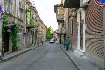 Gordijnen Smalle Straten View of traditional narrow streets of Old Tbilisi  © Yakup