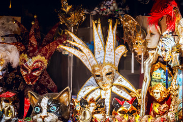 Colorful carnival masks at a souvenir stall in the old city of Kotor Balkan countries, South-East...