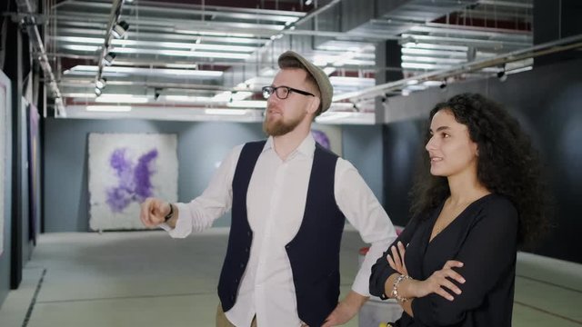 Young people discussing contemporary artwork