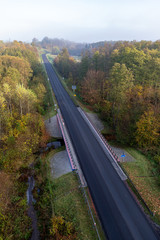 Asphalt road for cars seen from the bridge. Transport route in Central Europe.