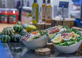 salad bar with onions and lemon