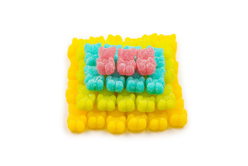 Pyramid of jelly sweats bears isolated on white background.