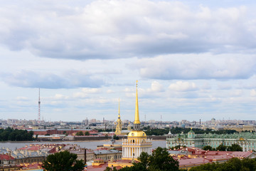 Fototapeta na wymiar Saint Petersburg, Russia, August 2019. Panoramic aerial view of the city from the dome of Saint Isaac Cathedral. In this image is visible the Ermitage Museum and the Admiralteystvo building