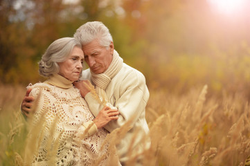 Fototapeta premium Portrait of unhappy old couple in the park