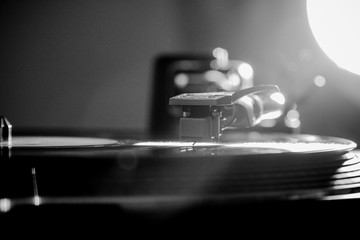 Close up of turntable needle on a vinyl record. Turntable playing vinyl.